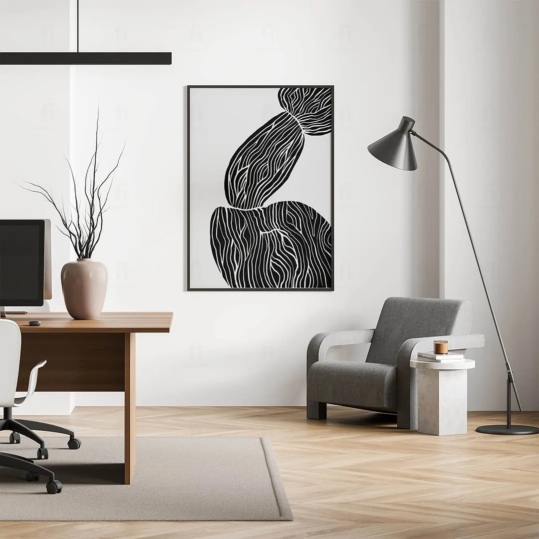 Plakat "Kamienie" wiszący w salonie w stylu japandi nad niską, drewnianą szafką.