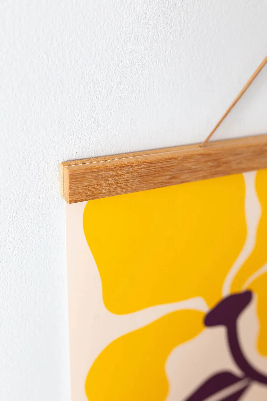 Drewniany wieszak na plakat