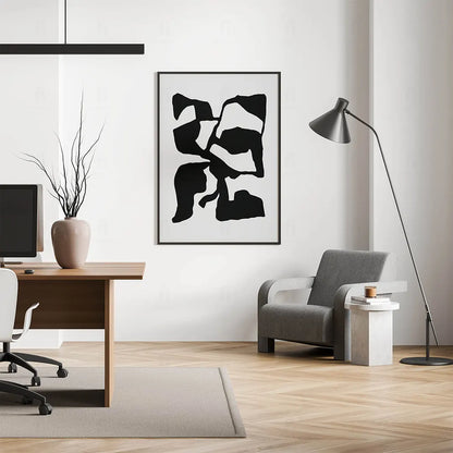 Duży, czarno-biały plakat abstrakcyjny wiszący w nowoczesnym biurze
