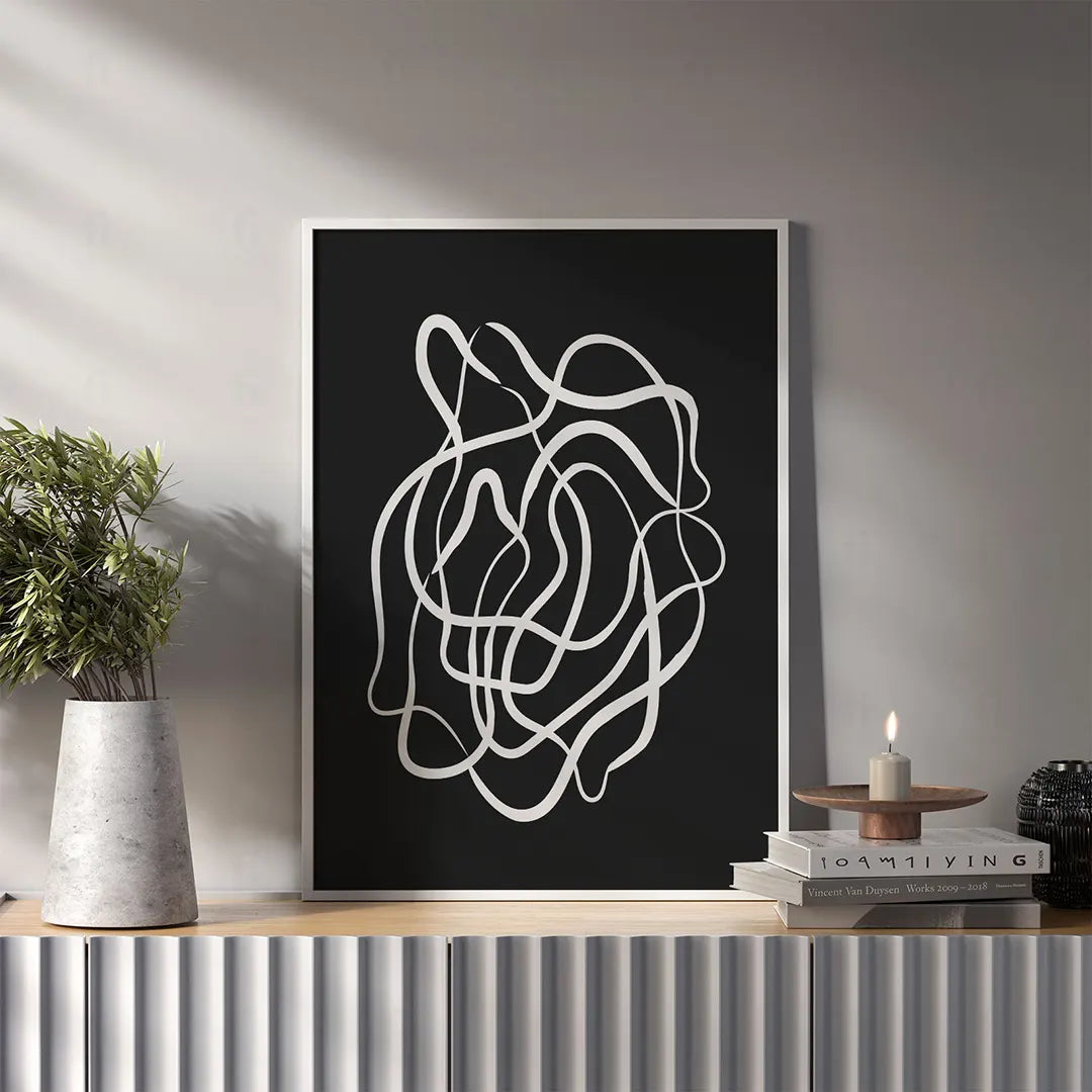 Plakat abstrakcyjny z liniami wiszący w nowoczesnym salonie