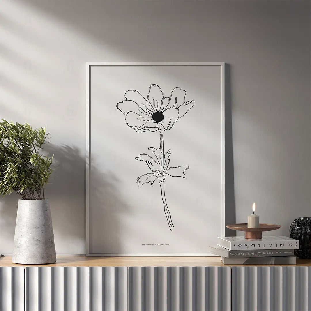 Plakat z anemonem wiszący w sypialni w stylu minimalistycznym.

