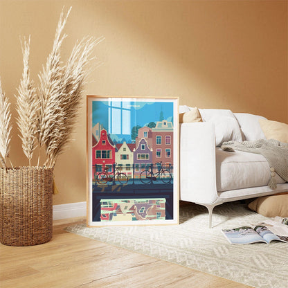 Plakat z artystyczną grafiką – kolorowe kamienice nad kanałem w Amsterdamie